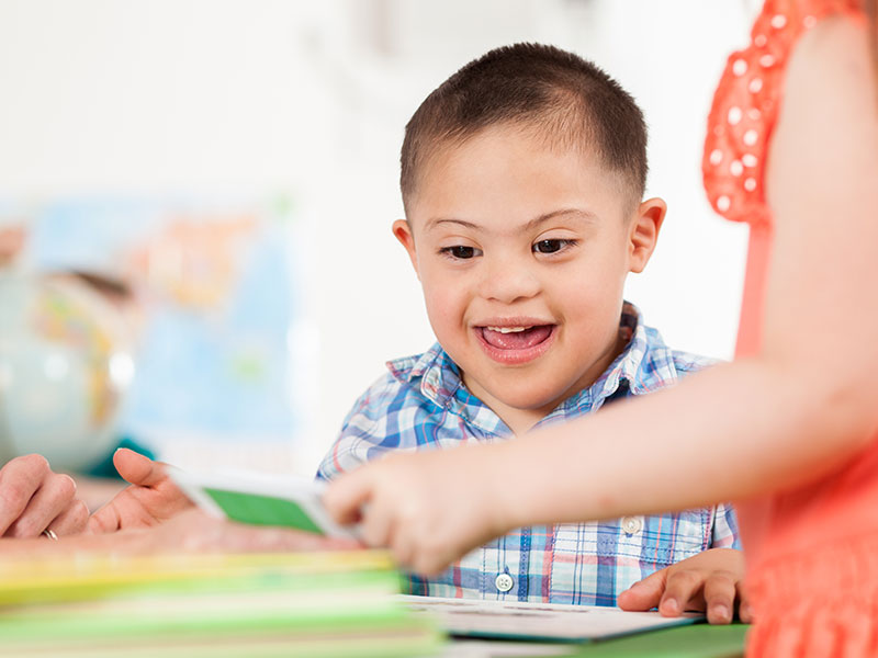 Young boy working with flash cards