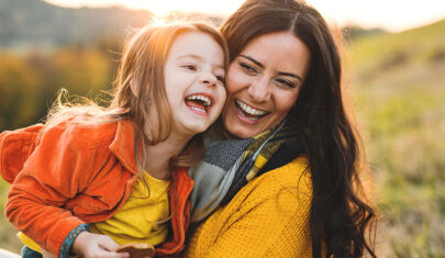 Mother and daughter laughing