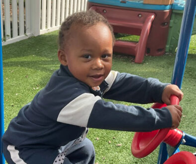 Young boy playing outside