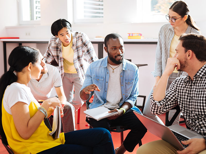 Six adults having a meeting